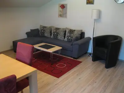 Ein Sitzbereich in der Unterkunft Appartement Geisler