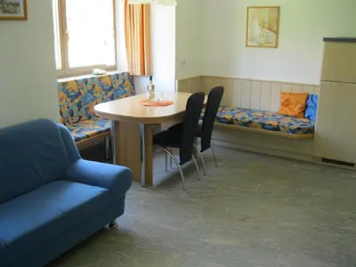 Ein Sitzbereich in der Unterkunft Appartement Geisler