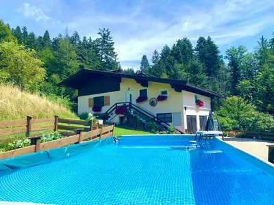Der Swimmingpool an oder in der Nähe von Sunnseit Lodge - Kitzbüheler Alpen