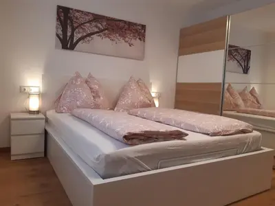 Ein Bett oder Betten in einem Zimmer der Unterkunft Ferienwohnung - Gwiggner Daniela im Haus Bergfried