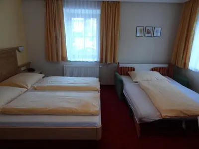 Ein Bett oder Betten in einem Zimmer der Unterkunft Hotel Unterwirt - Jokercard im Sommer inklusive