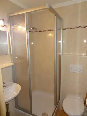 Ein Badezimmer in der Unterkunft Hotel Unterwirt - Jokercard im Sommer inklusive