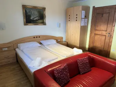 Ein Bett oder Betten in einem Zimmer der Unterkunft Alpenlodge, Ferienwohnung 19