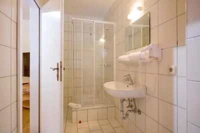 Ein Badezimmer in der Unterkunft Alpenlodge, Ferienwohnung 19
