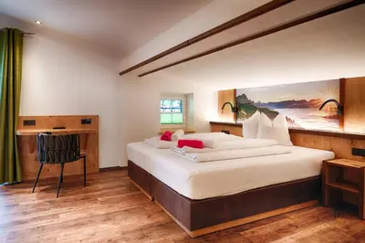Ein Bett oder Betten in einem Zimmer der Unterkunft Ferienpension Bierbaumer