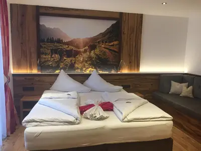 Ein Bett oder Betten in einem Zimmer der Unterkunft Ferienpension Bierbaumer