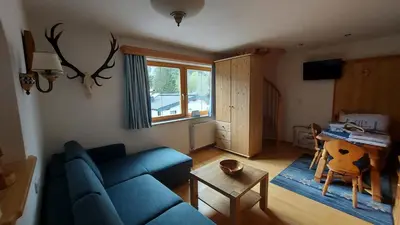 Ein Sitzbereich in der Unterkunft Adlerblick