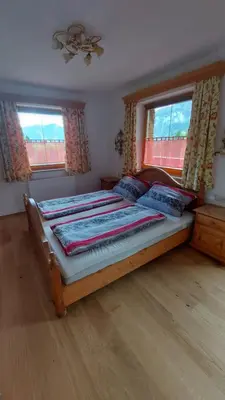 Ein Bett oder Betten in einem Zimmer der Unterkunft Adlerblick