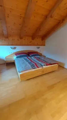 Ein Bett oder Betten in einem Zimmer der Unterkunft Adlerblick