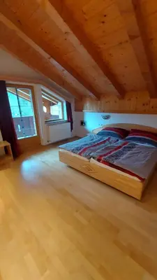 Ein Bett oder Betten in einem Zimmer der Unterkunft Adlerblick