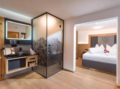 Ein Bett oder Betten in einem Zimmer der Unterkunft Dorfkaiser Appartements