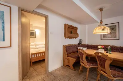 Ein Bett oder Betten in einem Zimmer der Unterkunft Rosenhof am See Ferienwohnungen
