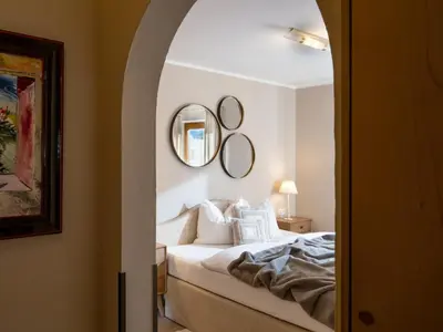 Ein Bett oder Betten in einem Zimmer der Unterkunft Ferienwohnung Lentner