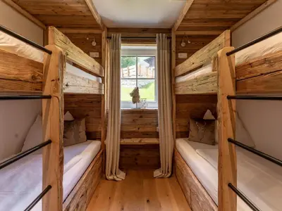 Ein Bett oder Betten in einem Zimmer der Unterkunft Tauernlodge Krimml 1A