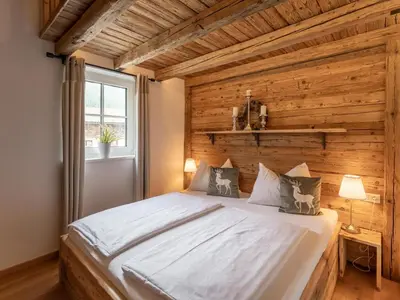 Ein Bett oder Betten in einem Zimmer der Unterkunft Tauernlodge Krimml 1A