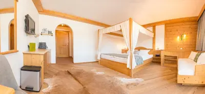 Ein Bett oder Betten in einem Zimmer der Unterkunft Hotel Frohnatur