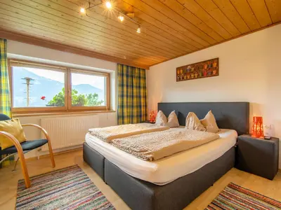 Ein Bett oder Betten in einem Zimmer der Unterkunft Ferienhaus Tenndl II