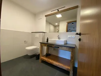 Ein Badezimmer in der Unterkunft Wood Apartments by Trendlbrugger