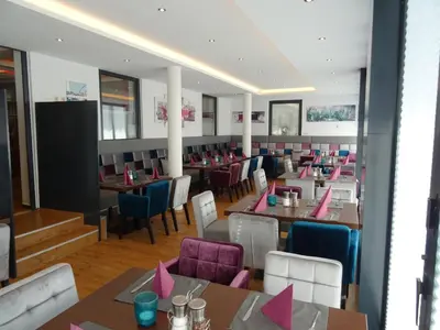 Ein Sitzbereich in der Unterkunft Hotel Restaurant Rosengarten
