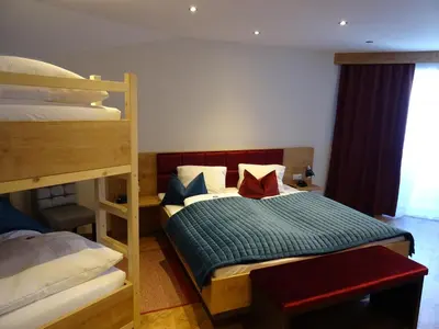 Ein Bett oder Betten in einem Zimmer der Unterkunft Hotel Restaurant Rosengarten