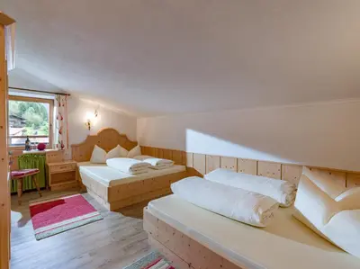 Ein Bett oder Betten in einem Zimmer der Unterkunft Appartement Andrea Hauser - Riedltischler