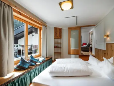 Ein Bett oder Betten in einem Zimmer der Unterkunft Appartement Andrea Hauser - Riedltischler