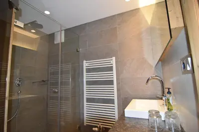 Ein Badezimmer in der Unterkunft Villa Alpin