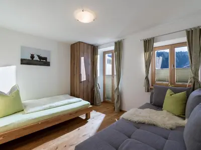 Ein Sitzbereich in der Unterkunft Ferienwohnung Döllerer