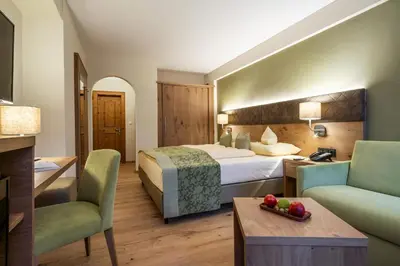 Ein Bett oder Betten in einem Zimmer der Unterkunft derNeuwirt