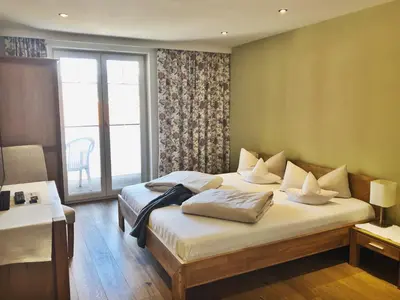 Ein Bett oder Betten in einem Zimmer der Unterkunft derNeuwirt