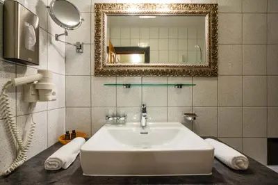 Ein Badezimmer in der Unterkunft derNeuwirt