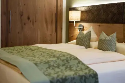 Ein Bett oder Betten in einem Zimmer der Unterkunft derNeuwirt