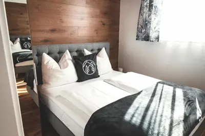 Ein Bett oder Betten in einem Zimmer der Unterkunft Landhaus Andrea Saalbach
