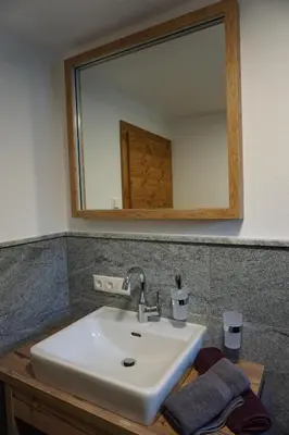 Ein Badezimmer in der Unterkunft Apartments Edinger