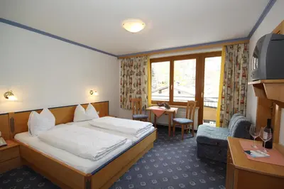 Ein Bett oder Betten in einem Zimmer der Unterkunft Hotel Bärenbachhof - Joker card included in summer