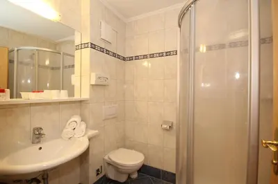 Ein Badezimmer in der Unterkunft Hotel Bärenbachhof - Joker card included in summer