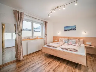 Ein Bett oder Betten in einem Zimmer der Unterkunft Apartment Daisy