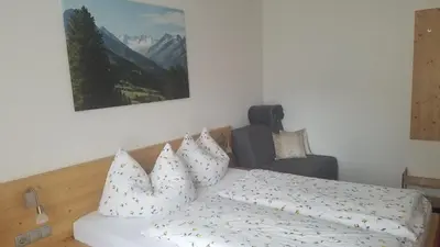 Ein Bett oder Betten in einem Zimmer der Unterkunft Haus Maria