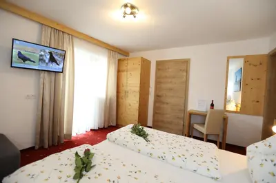Ein Bett oder Betten in einem Zimmer der Unterkunft Haus Maria