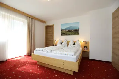 Ein Bett oder Betten in einem Zimmer der Unterkunft Haus Maria