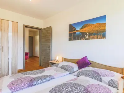 Ein Bett oder Betten in einem Zimmer der Unterkunft Ferienwohnung Feiel