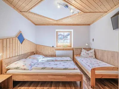 Ein Bett oder Betten in einem Zimmer der Unterkunft Bergzeit