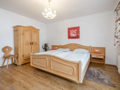 Ein Bett oder Betten in einem Zimmer der Unterkunft Birgit Hinterglemm