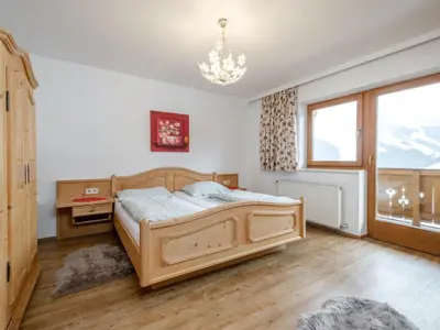 Ein Bett oder Betten in einem Zimmer der Unterkunft Birgit Hinterglemm