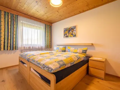 Ein Bett oder Betten in einem Zimmer der Unterkunft Ferienwohnung Horvath