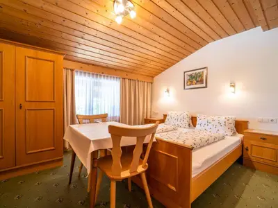 Ein Bett oder Betten in einem Zimmer der Unterkunft Ferienhaus Almhof