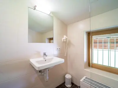 Ein Badezimmer in der Unterkunft Ferienhaus Almhof