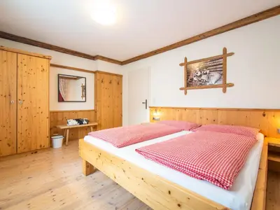 Ein Bett oder Betten in einem Zimmer der Unterkunft Arenablick