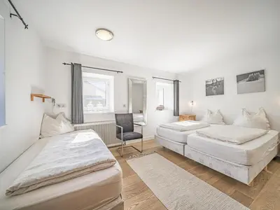 Ein Bett oder Betten in einem Zimmer der Unterkunft Chalet Adriana