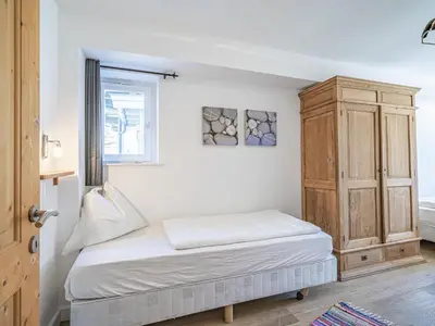 Ein Bett oder Betten in einem Zimmer der Unterkunft Chalet Adriana